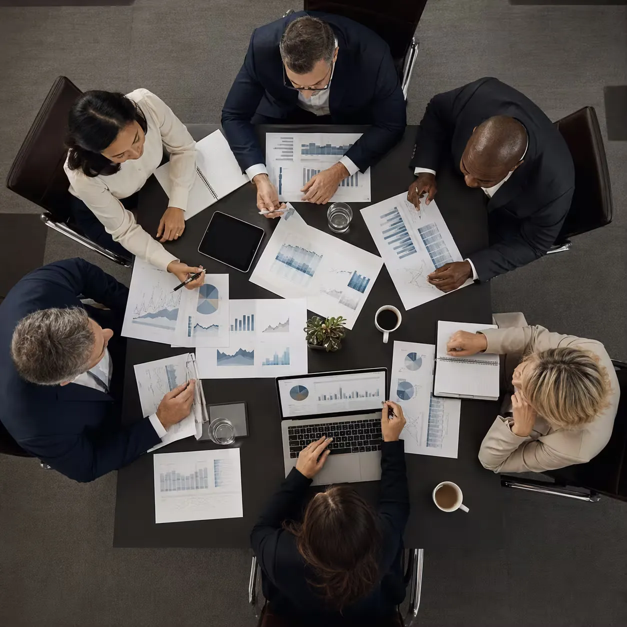 Executives reviewing a financial S&OP plan focused on margin, cash, and risk. Executives reviewing a financial S&OP plan focused on margin, cash, and risk.