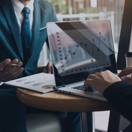 Business owners analyzing the company's operational excellence. Business owners analyzing the company's operational excellence.